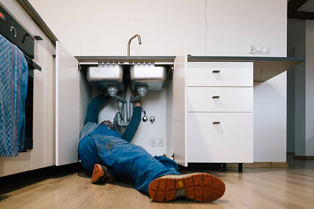 Professional Emergency Plumber technician working in Canton, OH